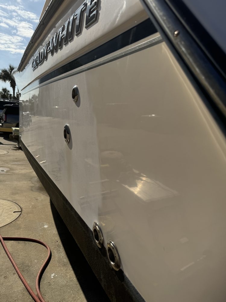 The side of a Grady-White hull, smooth and glossy
