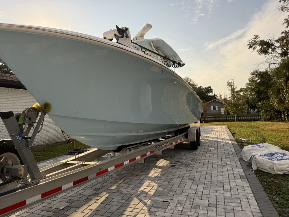 The seafoam center console bow on its trailer