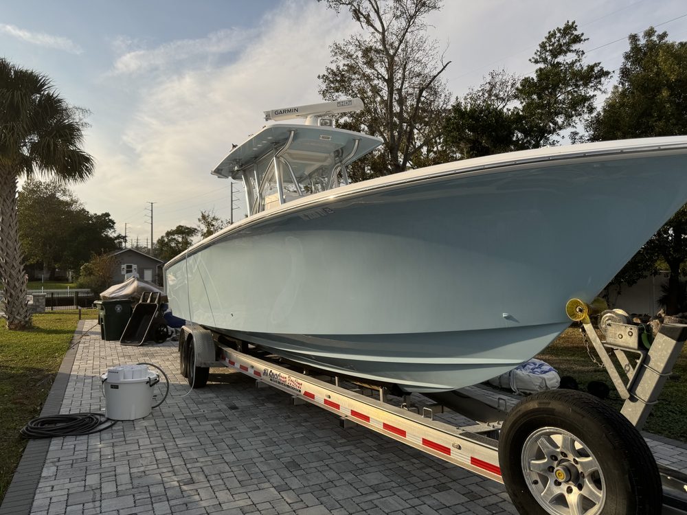 A seafoam green center console on its trailer