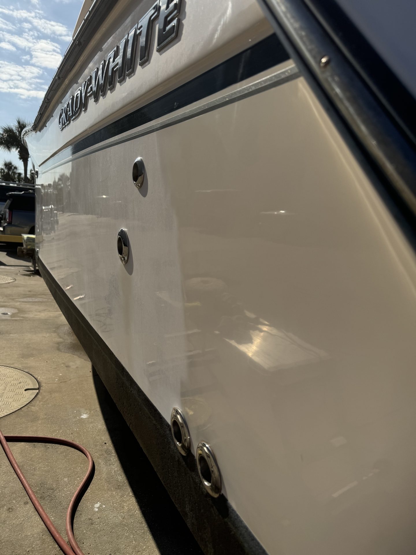 The side of a Grady-White hull, smooth and glossy