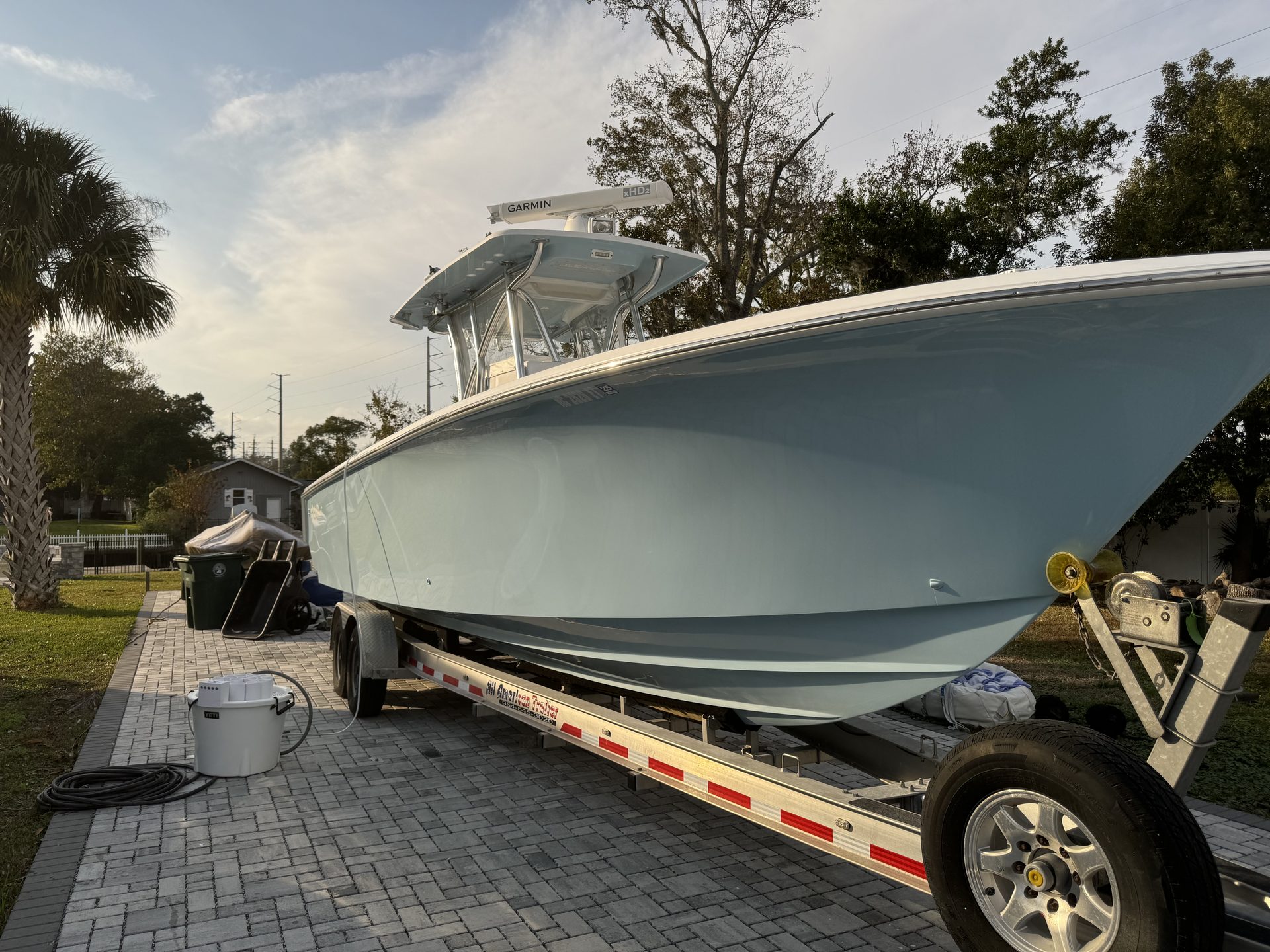 A seafoam green center console on its trailer